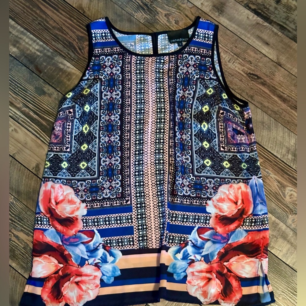 Brand new tank top. Hangs below the waist. Light weight and so colorful!!!